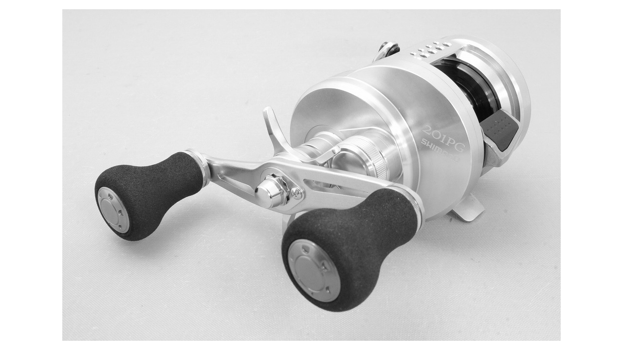 Shimano 15 ocea conquest 201-pg baitcasting reel for tai-rubber