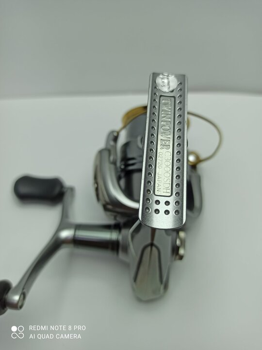 Катушка спиннинговая shimano twinpower 11 c3000sdh Катушка спиннинговая shimano twinpower 11 c3000sdh